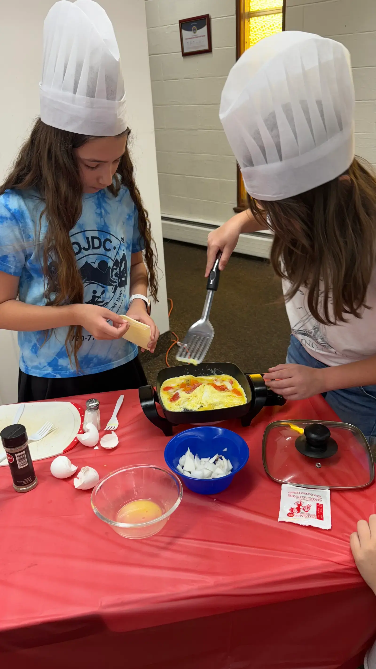 Campers cooking together at the camp kitchen workshop